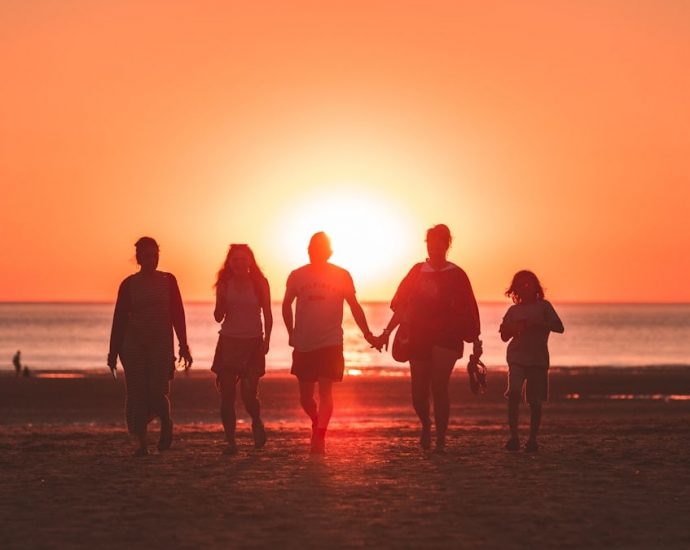 I was randomly shooting the sunset when a family decided to walk back from the sea to the beach, I was just perfectly aligned with them and the golden hour sun. Captured the cute moment where the mother and father were holding hands. They noticed me afterwards and they asked if I had an instagram so they could see my work. We had a little chat and I showed the fresh photo directly on my camera screen, they were really happy with it !
I love the tones and how the backlight enhances group.