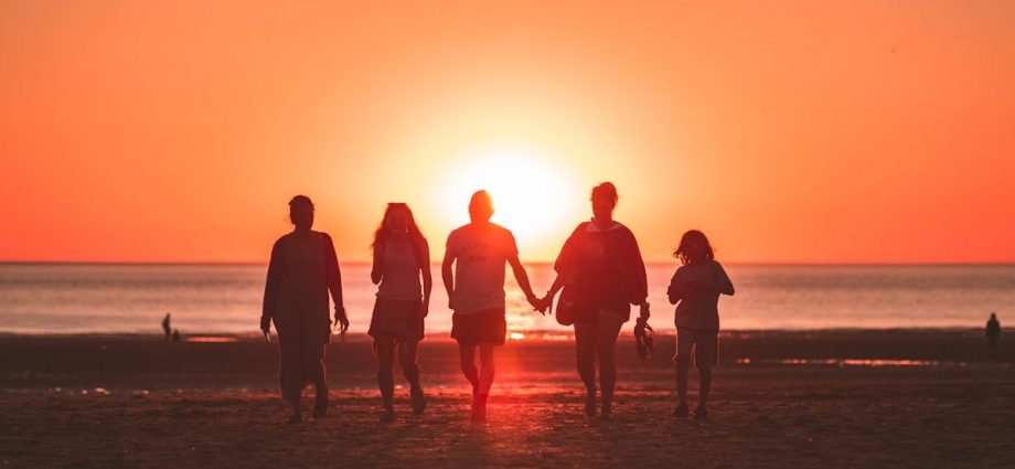 I was randomly shooting the sunset when a family decided to walk back from the sea to the beach, I was just perfectly aligned with them and the golden hour sun. Captured the cute moment where the mother and father were holding hands. They noticed me afterwards and they asked if I had an instagram so they could see my work. We had a little chat and I showed the fresh photo directly on my camera screen, they were really happy with it !
I love the tones and how the backlight enhances group.
